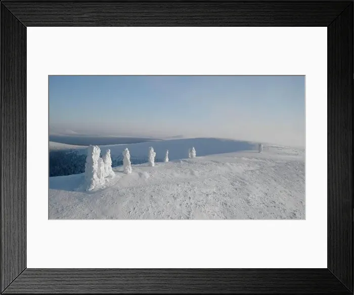 Framed Print : Flying above snow covered unusual pillars on a clear blue sky background. Clip. Forest and snow covered valley Framed Print : Flying above snow covered unusual pillars on a clear blue sky background. Clip. Forest and snow covered valley