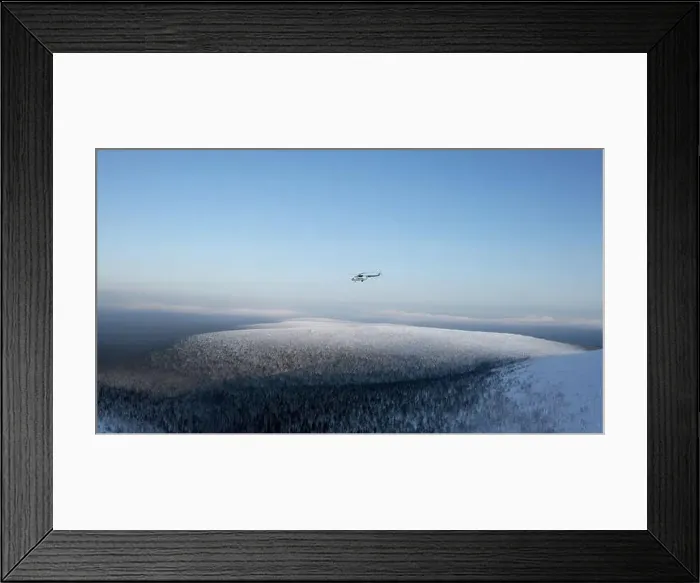 Framed Print : Aerial winter view of giants of the Manpupuner Plateau, Komi Republic. Clip. Helicopter flying above snow covered hills Framed Print : Aerial winter view of giants of the Manpupuner Plateau, Komi Republic. Clip. Helicopter flying above snow covered hills