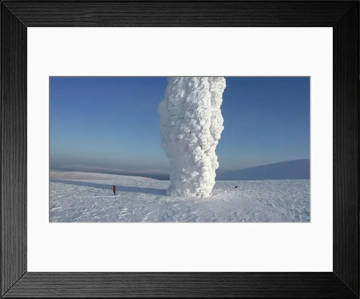 Framed Print : Snow covered stone blocks and white valley. Clip. Aerial view of Manpupuner in winter