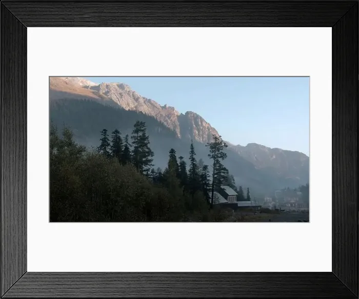 Framed Print : Sunrise above mountains and growing trees Framed Print : Sunrise above mountains and growing trees