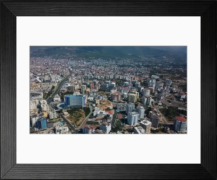 Framed Print : Aerial view of a city with many woman. Clip. Summer green city in a morning haze