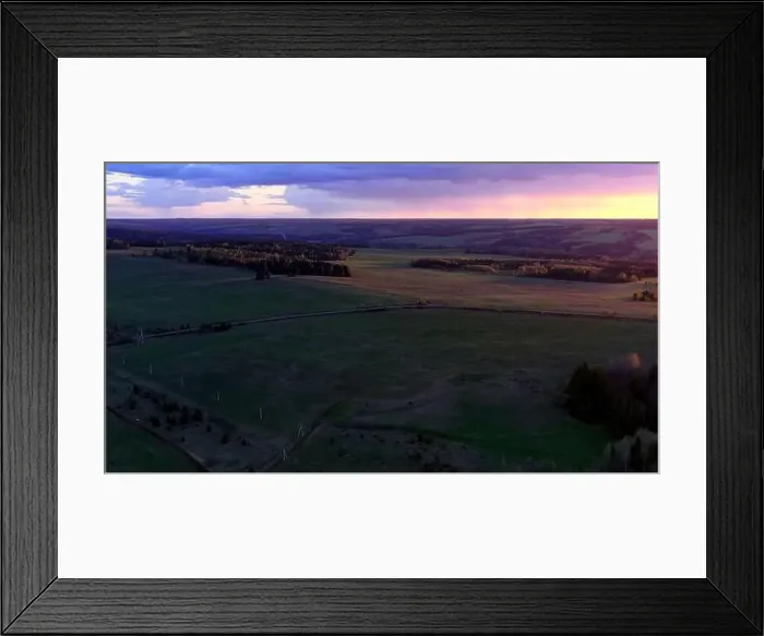 Framed Print : Aerial view beautiful summer sunset or sunrise. Clip. Drone flying over field, natural landscape, forest and field Framed Print : Aerial view beautiful summer sunset or sunrise. Clip. Drone flying over field, natural landscape, forest and field