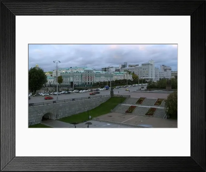 Framed Print : Aerial view of a city center on a cloudy sky background Framed Print : Aerial view of a city center on a cloudy sky background