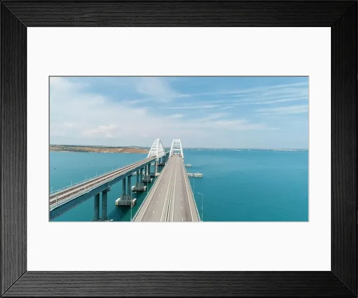 Framed Print : Aerial breathtaking view of the turquoise sea and a long white bridge with arcuate shape