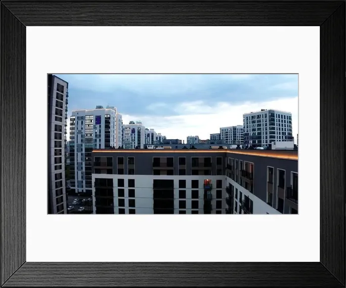 Framed Print : Aerial view of the cityscape with residential complex. Stock footage. New city district with many high rise buildings Framed Print : Aerial view of the cityscape with residential complex. Stock footage. New city district with many high rise buildings