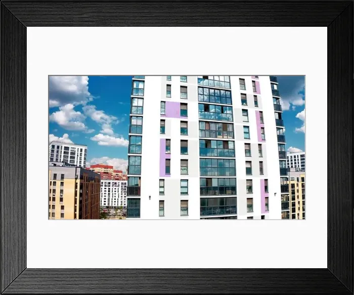 Framed Print : Aerial view of a high residential building of a newly built city aeria. Stock footage. Concept of urbanization Framed Print : Aerial view of a high residential building of a newly built city aeria. Stock footage. Concept of urbanization