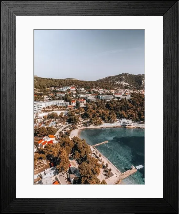 Framed Print : Aerial shot captures the beauty of Hvar's coastline at sunrise on a summer morning Framed Print : Aerial shot captures the beauty of Hvar's coastline at sunrise on a summer morning