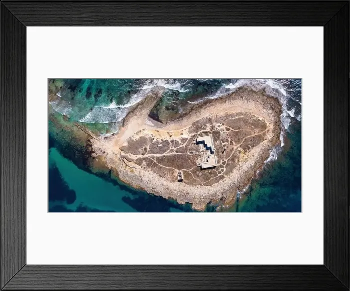 Framed Print : Aerial drone. The island and beach of Isola delle Correnti with an old lighthouse Framed Print : Aerial drone. The island and beach of Isola delle Correnti with an old lighthouse