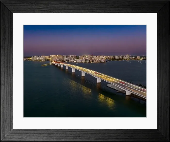 Framed Print : Evening aerial image of the Sarasota, Florida Skyline and Bridge Across Sarasota Bay Framed Print : Evening aerial image of the Sarasota, Florida Skyline and Bridge Across Sarasota Bay