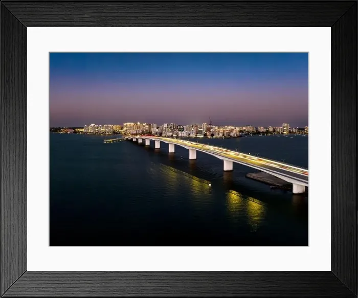 Framed Print : Evening aerial image of the Sarasota, Florida Skyline and Bridge Across Sarasota Bay Framed Print : Evening aerial image of the Sarasota, Florida Skyline and Bridge Across Sarasota Bay