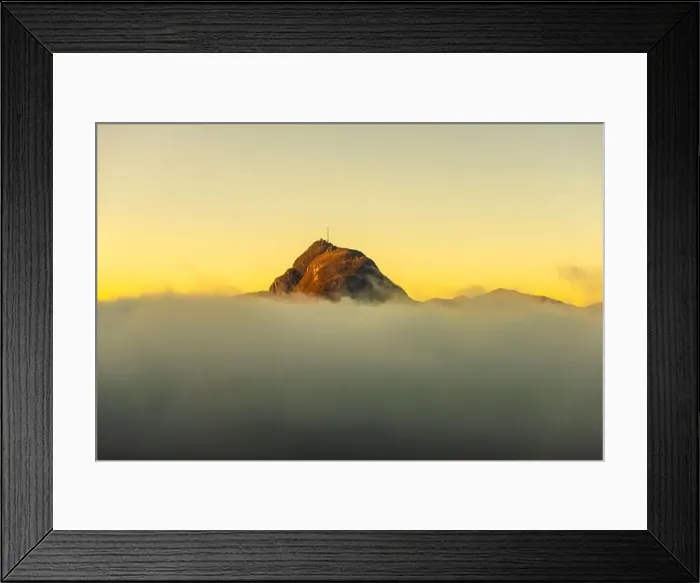 Framed Print : Mountain Peak San Salvatore Above Cloudscape with Sunlight and Clear Sky in Lugano, Ticino in Switzerland Framed Print : Mountain Peak San Salvatore Above Cloudscape with Sunlight and Clear Sky in Lugano, Ticino in Switzerland