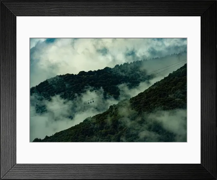 Framed Print : Mountain Cable Car with Clouds and Sunlight in Miglieglia, Ticino, Switzerland Framed Print : Mountain Cable Car with Clouds and Sunlight in Miglieglia, Ticino, Switzerland