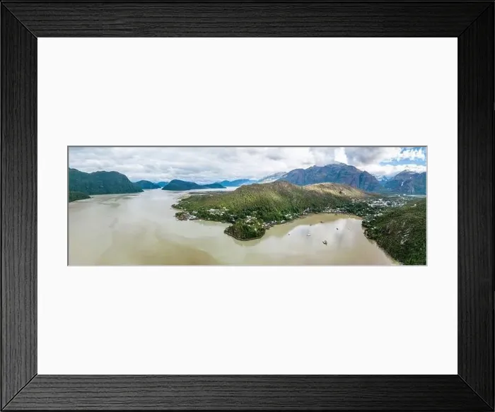Framed Print : Panorama view of Caleta Tortel with its small cabins - Discovering the beautiful village while traveling the Carretera Framed Print : Panorama view of Caleta Tortel with its small cabins - Discovering the beautiful village while traveling the Carretera