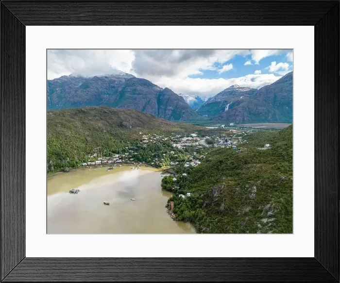 Framed Print : Drone view of Caleta Tortel with its small cabins - Discovering the beautiful village while traveling the Carretera Framed Print : Drone view of Caleta Tortel with its small cabins - Discovering the beautiful village while traveling the Carretera