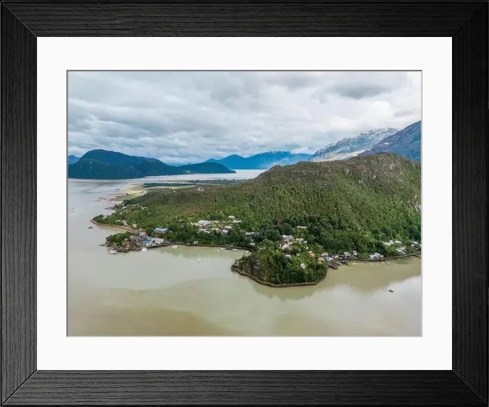 Framed Print : Drone view of Caleta Tortel with its small cabins - Discovering the beautiful village while traveling the Carretera Framed Print : Drone view of Caleta Tortel with its small cabins - Discovering the beautiful village while traveling the Carretera