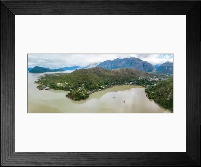 Framed Print : Panorama view of Caleta Tortel with its small cabins - Discovering the beautiful village while traveling the Carretera Framed Print : Panorama view of Caleta Tortel with its small cabins - Discovering the beautiful village while traveling the Carretera