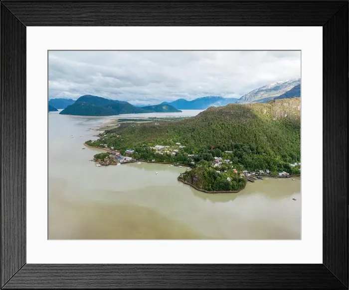 Framed Print : Drone view of Caleta Tortel with its small cabins - Discovering the beautiful village while traveling the Carretera Framed Print : Drone view of Caleta Tortel with its small cabins - Discovering the beautiful village while traveling the Carretera