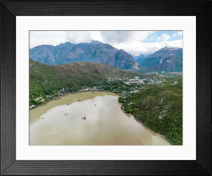 Framed Print : Drone view of Caleta Tortel with its small cabins - Discovering the beautiful village while traveling the Carretera Framed Print : Drone view of Caleta Tortel with its small cabins - Discovering the beautiful village while traveling the Carretera