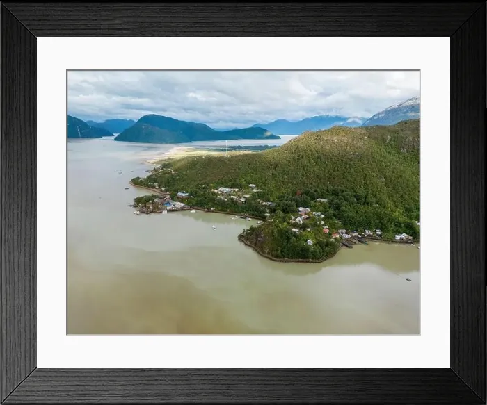Framed Print : Drone view of Caleta Tortel with its small cabins - Discovering the beautiful village while traveling the Carretera Framed Print : Drone view of Caleta Tortel with its small cabins - Discovering the beautiful village while traveling the Carretera