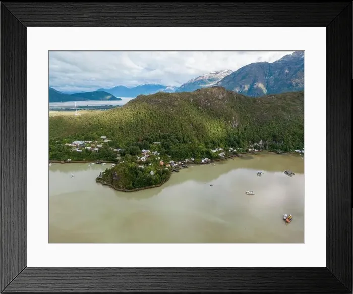 Framed Print : Drone view of Caleta Tortel with its small cabins - Discovering the beautiful village while traveling the Carretera Framed Print : Drone view of Caleta Tortel with its small cabins - Discovering the beautiful village while traveling the Carretera