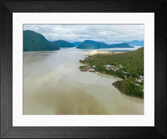 Framed Print : Drone view of Caleta Tortel with its small cabins - Discovering the beautiful village while traveling the Carretera Framed Print : Drone view of Caleta Tortel with its small cabins - Discovering the beautiful village while traveling the Carretera