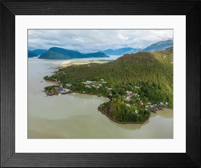 Framed Print : Drone view of Caleta Tortel with its small cabins - Discovering the beautiful village while traveling the Carretera Framed Print : Drone view of Caleta Tortel with its small cabins - Discovering the beautiful village while traveling the Carretera