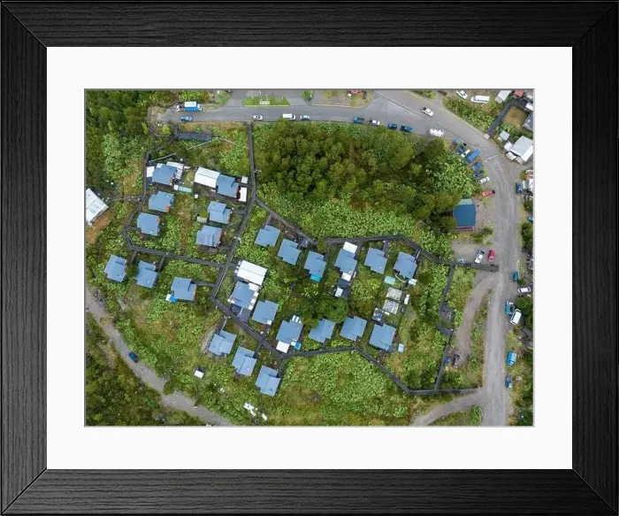 Framed Print : Drone view of Tortel with its small cabins - Discovering the beautiful village while traveling the Carretera Austral in Framed Print : Drone view of Tortel with its small cabins - Discovering the beautiful village while traveling the Carretera Austral in