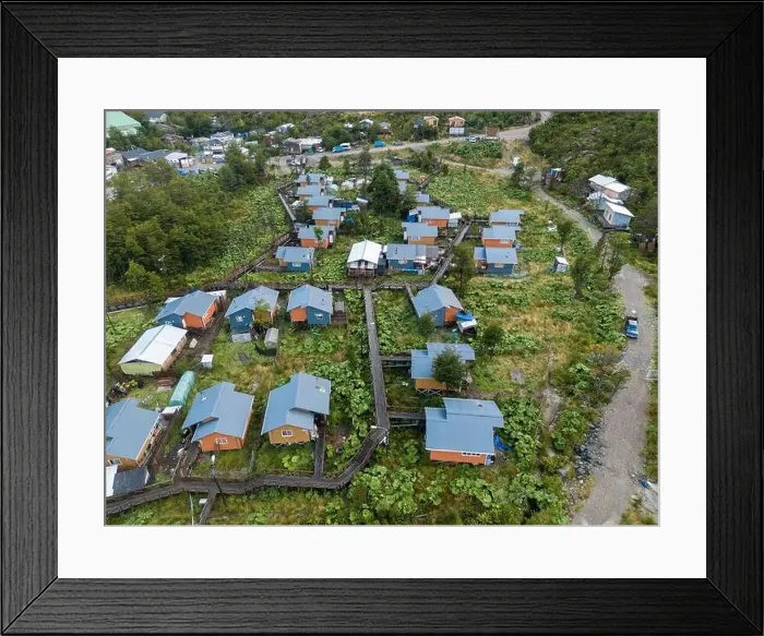 Framed Print : Drone view of Tortel with its small cabins - Discovering the beautiful village while traveling the Carretera Austral in Framed Print : Drone view of Tortel with its small cabins - Discovering the beautiful village while traveling the Carretera Austral in