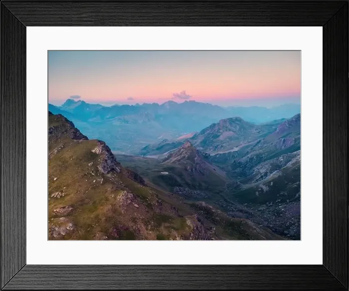 Framed Print : Drone view of picturesque landscape with Anayet mountain range covered with green grass under sky in Pyrenees Framed Print : Drone view of picturesque landscape with Anayet mountain range covered with green grass under sky in Pyrenees