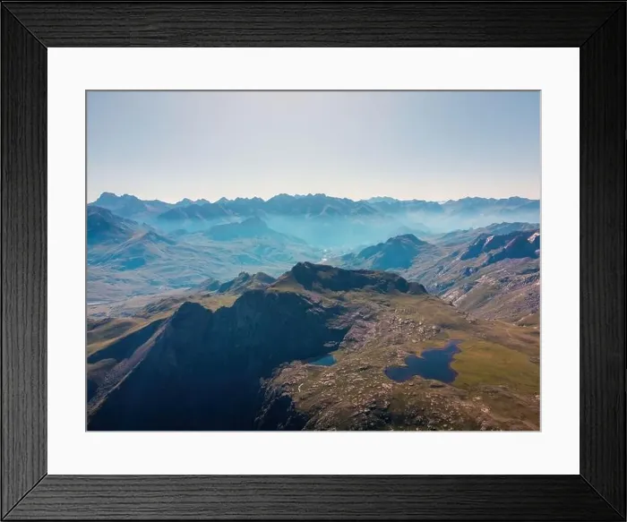 Framed Print : Drone view of picturesque landscape with Anayet mountain range covered with green grass Framed Print : Drone view of picturesque landscape with Anayet mountain range covered with green grass