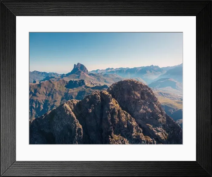 Framed Print : Drone view of spectacular landscape with massive rocky Anayet mountain range against blue cloudless sky in daytime in Framed Print : Drone view of spectacular landscape with massive rocky Anayet mountain range against blue cloudless sky in daytime in