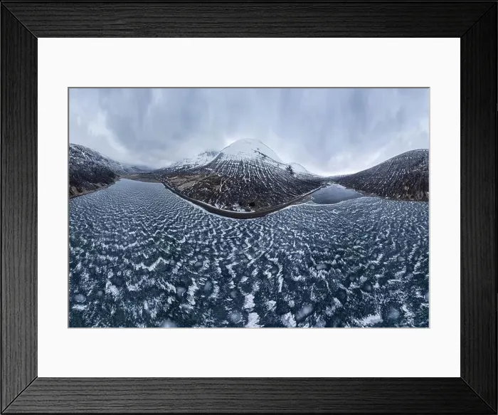 Framed Print : Wide angle drone view of frozen lake surrounded by snowy mountains under cloudy gloomy sky in Vatnajokull National Park Framed Print : Wide angle drone view of frozen lake surrounded by snowy mountains under cloudy gloomy sky in Vatnajokull National Park
