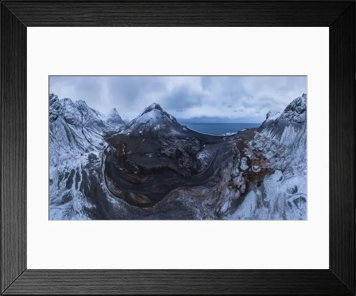 Framed Print : Scenic aerial view of river estuary located in valley near snowy mountain range on cold winter day in southeast Iceland Framed Print : Scenic aerial view of river estuary located in valley near snowy mountain range on cold winter day in southeast Iceland