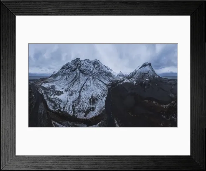 Framed Print : Scenic aerial view of river estuary located in valley near snowy mountain range on cold winter day in southeast Iceland Framed Print : Scenic aerial view of river estuary located in valley near snowy mountain range on cold winter day in southeast Iceland