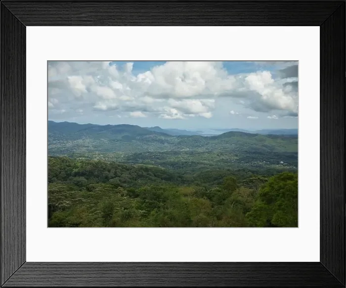 Framed Print : Panorama drone shot over rainforest on Flores with green hills in background Framed Print : Panorama drone shot over rainforest on Flores with green hills in background
