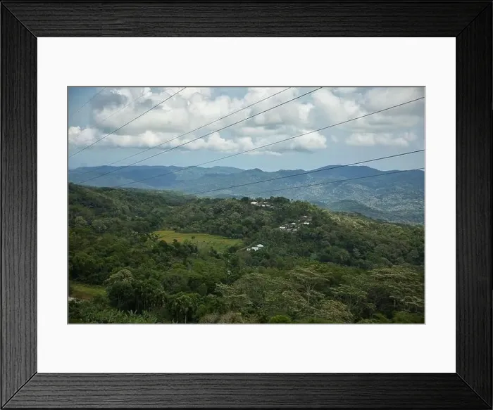 Framed Print : Panorama drone shot over rainforest on Flores with green hills in background Framed Print : Panorama drone shot over rainforest on Flores with green hills in background
