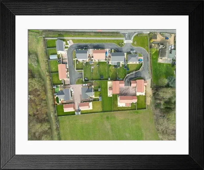 Framed Print : Top down drone view of a small housing development at the edge of an East Anglian village Framed Print : Top down drone view of a small housing development at the edge of an East Anglian village