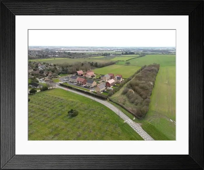 Framed Print : Aerial view of a new social and private housing development at the edge of an East Anglian village Framed Print : Aerial view of a new social and private housing development at the edge of an East Anglian village