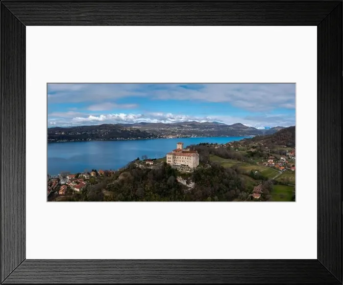 Framed Print : Angera, Italy - 14 March, 2023: view of the historic Borromea Castle near Angera on the shroes of Lake Maggiore Framed Print : Angera, Italy - 14 March, 2023: view of the historic Borromea Castle near Angera on the shroes of Lake Maggiore