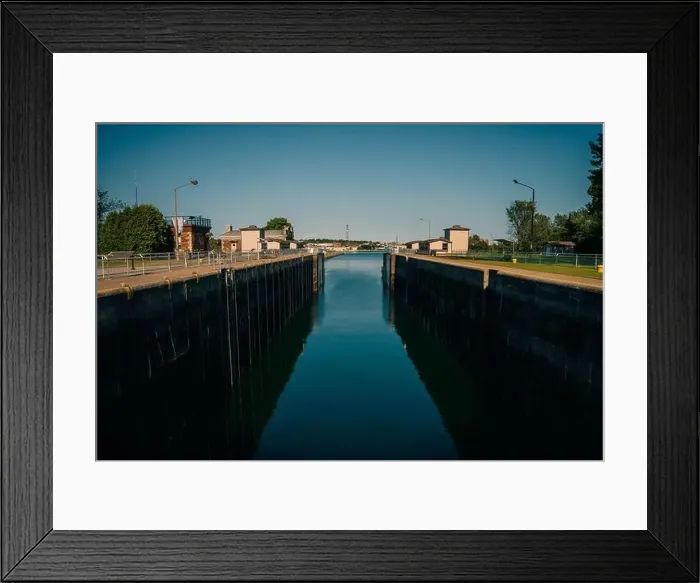 Framed Print : Sault Ste. Marie, ON, Canada-June 30, 2022 Historical building on the waterfront of the Soo Locks.. High quality photo Framed Print : Sault Ste. Marie, ON, Canada-June 30, 2022 Historical building on the waterfront of the Soo Locks.. High quality photo