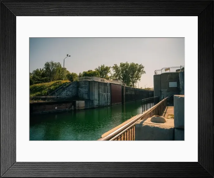 Framed Print : Sault Ste. Marie, ON, Canada-June 30, 2022 Historical building on the waterfront of the Soo Locks.. High quality photo Framed Print : Sault Ste. Marie, ON, Canada-June 30, 2022 Historical building on the waterfront of the Soo Locks.. High quality photo