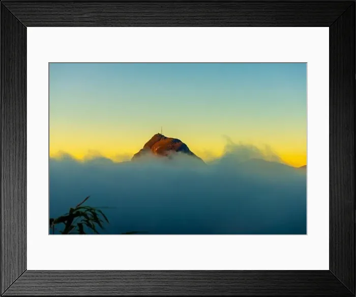 Framed Print : Mountain Peak San Salvatore Above Cloudscape with Sunlight and Clear Sky in Lugano, Ticino in Switzerland Framed Print : Mountain Peak San Salvatore Above Cloudscape with Sunlight and Clear Sky in Lugano, Ticino in Switzerland