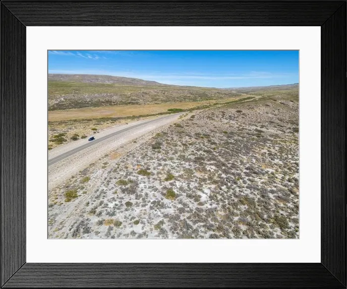 Framed Print : Drone view of the famous Ruta40 through the Argentinian Pampa in the Province Neuquén - Traveling South America Framed Print : Drone view of the famous Ruta40 through the Argentinian Pampa in the Province Neuquén - Traveling South America