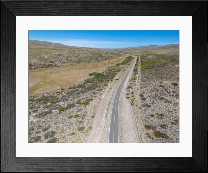 Framed Print : Drone view of the famous Ruta40 through the Argentinian Pampa in the Province Neuquén - Traveling South America Framed Print : Drone view of the famous Ruta40 through the Argentinian Pampa in the Province Neuquén - Traveling South America