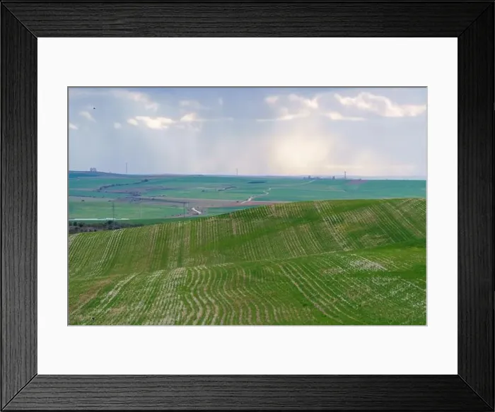 Framed Print : Fields of crops with a horizon of blue sky with clouds and sunbeams Framed Print : Fields of crops with a horizon of blue sky with clouds and sunbeams
