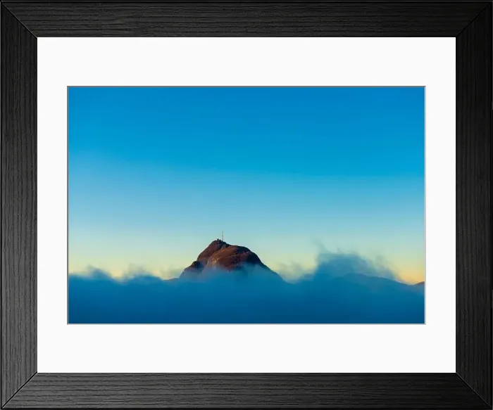 Framed Print : Mountain Peak San Salvatore Above Cloudscape with Sunlight and Clear Sky in Lugano, Ticino in Switzerland Framed Print : Mountain Peak San Salvatore Above Cloudscape with Sunlight and Clear Sky in Lugano, Ticino in Switzerland