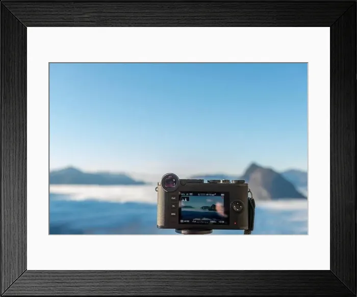 Framed Print : Camera Filming Mountain Peak San Salvatore Above Cloudscape with Sunlight and Clear Sky in Lugano Framed Print : Camera Filming Mountain Peak San Salvatore Above Cloudscape with Sunlight and Clear Sky in Lugano