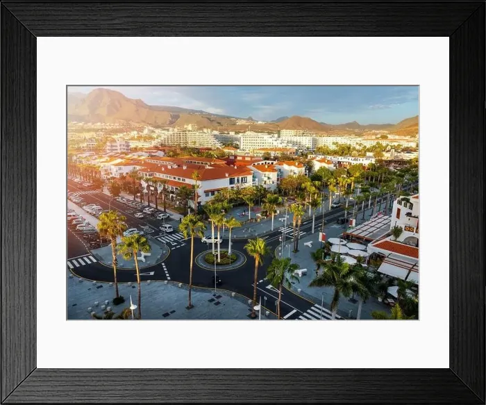 Framed Print : sunset cityscape of Playa de las Americas holiday resort streets in Tenerife. Canary islands, Spain Framed Print : sunset cityscape of Playa de las Americas holiday resort streets in Tenerife. Canary islands, Spain