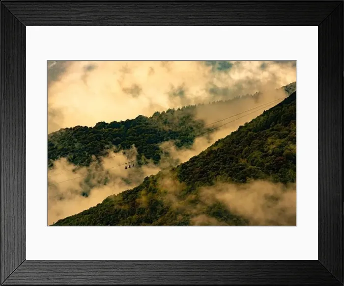 Framed Print : Mountain Cable Car with Clouds and Sunlight in Miglieglia, Ticino, Switzerland Framed Print : Mountain Cable Car with Clouds and Sunlight in Miglieglia, Ticino, Switzerland