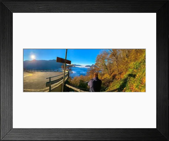 Framed Print : Panoramic View over Mountain Peak San Salvatore Above Cloudscape with Sunlight and Clear Sky in Lugano Framed Print : Panoramic View over Mountain Peak San Salvatore Above Cloudscape with Sunlight and Clear Sky in Lugano